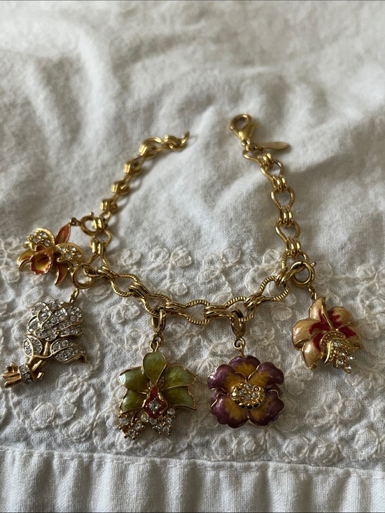 Nolan Miller Jewelry - Nolan Miller charm bracelet with orchid charms